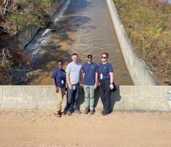 DC Water team in front of one of the reservoirs where Asheville gets its water.