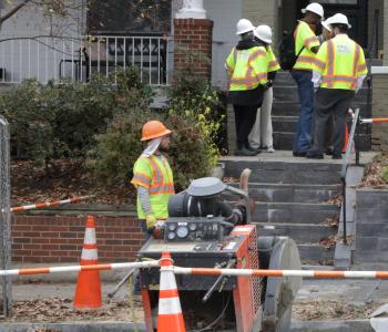 Lead Fee DC workers at home getting lead service line replacement