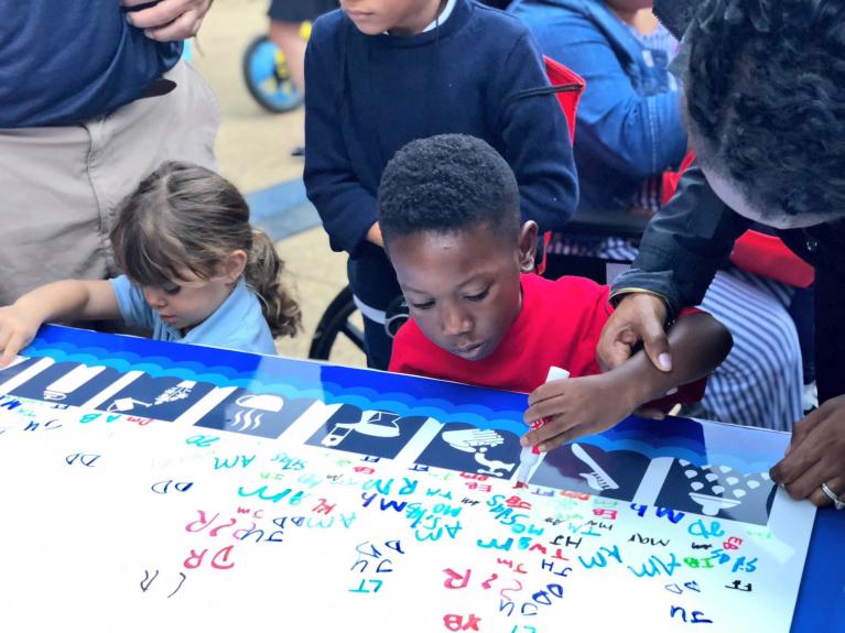 Young students share how they value the city's drinking water. 