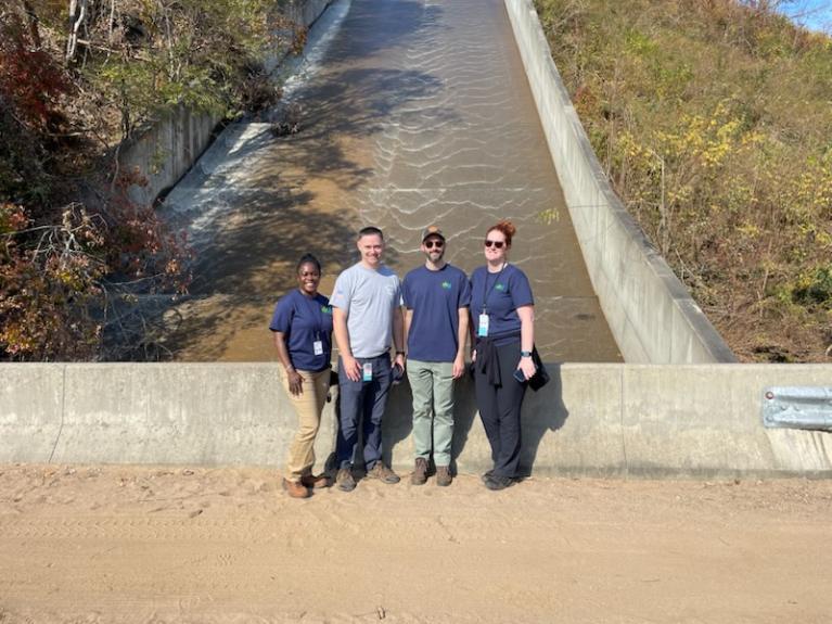 DC Water team in front of one of the reservoirs where Asheville gets its water.