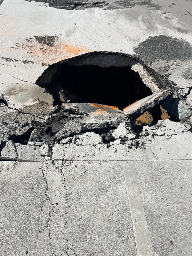 sinkhole on exit to South Dakota Avenue Northeast