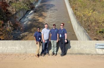 DC Water team in front of one of the reservoirs where Asheville gets its water.