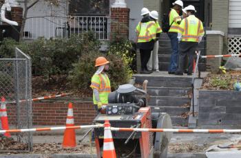 Lead Fee DC workers at home getting lead service line replacement