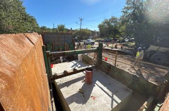 Anacostia Force Main Concrete Pour and Repair Completed Photo of completed repair with concrete encasing the sewr pipe