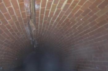 Rock Creek Main Inteceptor Interior Structural Damage Picture showing inside of Rock Creek Main Interceptor with large crack in crown